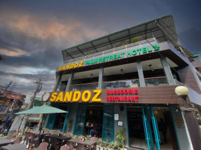 Sandoz Palm Retreat Hotel